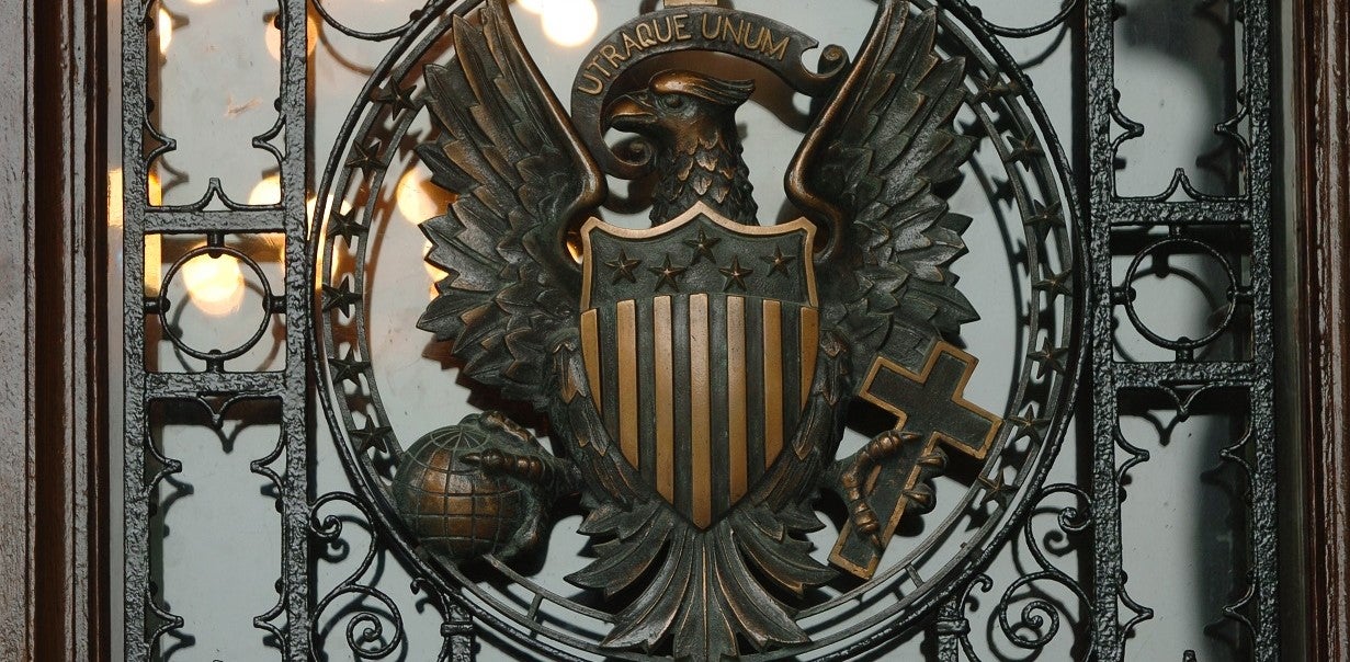 A detail of a door on Healy Hall depicting the Georgetown Seal