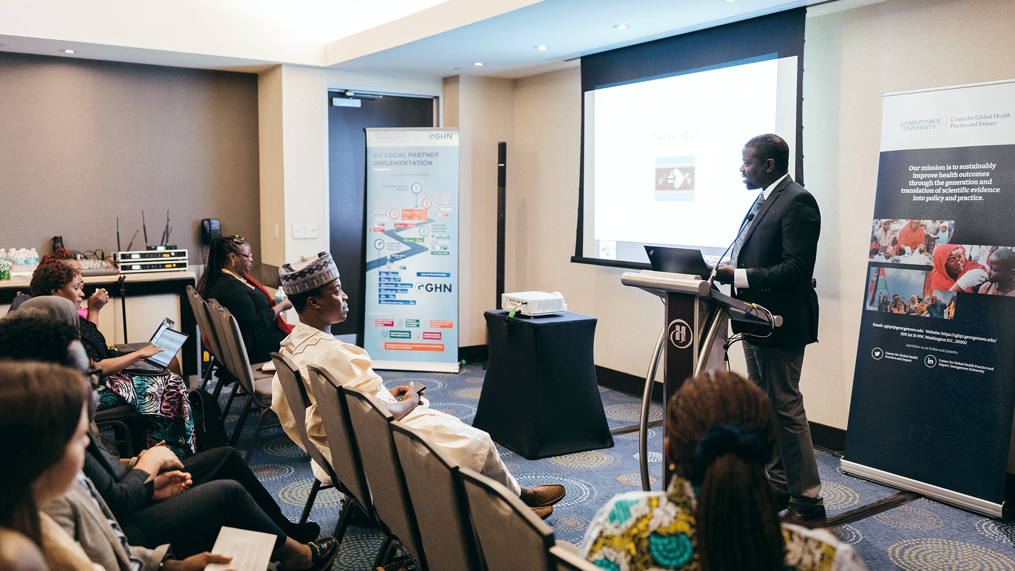 Dr. Babatunji Oni giving a lecture